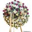Corona de flores para funeral montada en atril